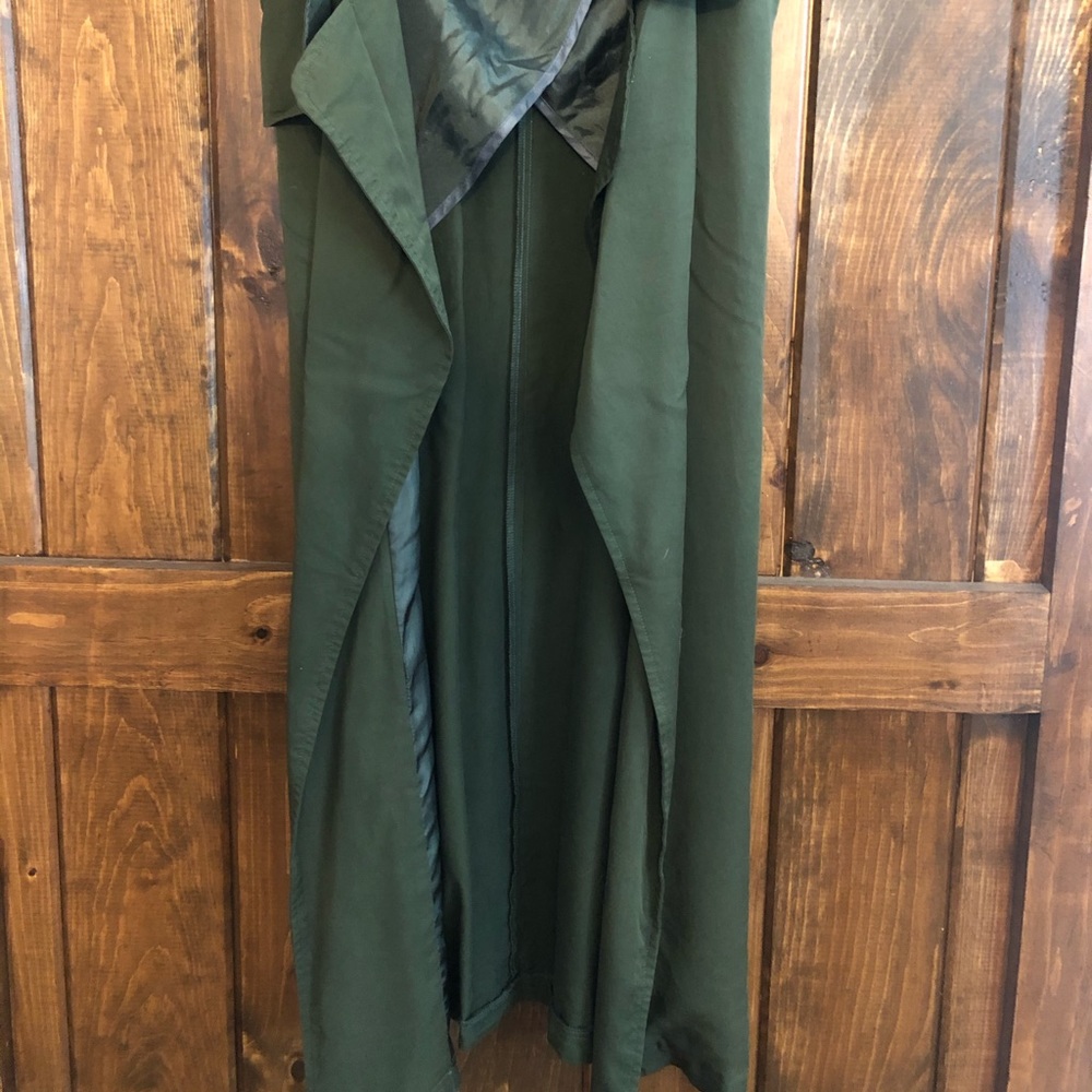 Woman’s green sleeveless jacket